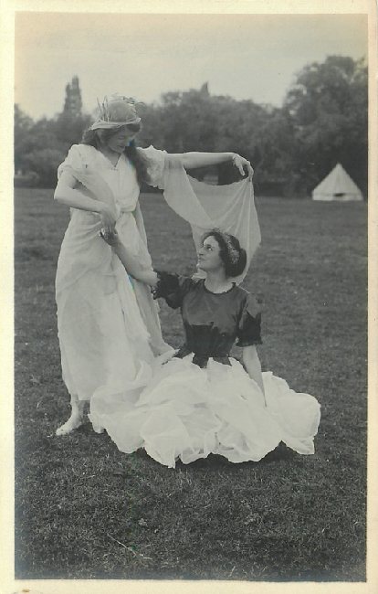 Two Young Women in a Field of Grass, Dressed in Spring Veils