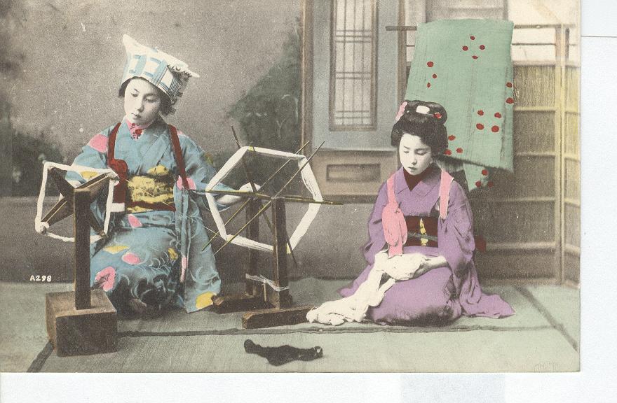 1909 Japan...Two Geisha Girls...Spinning Fabric